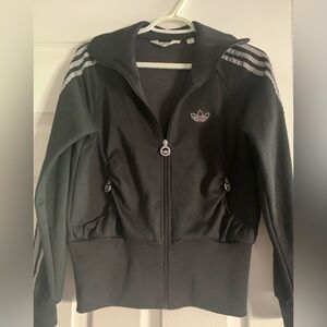 Adidas Short track jacket with silver stripes rhinestone logo. Full zip closure.
